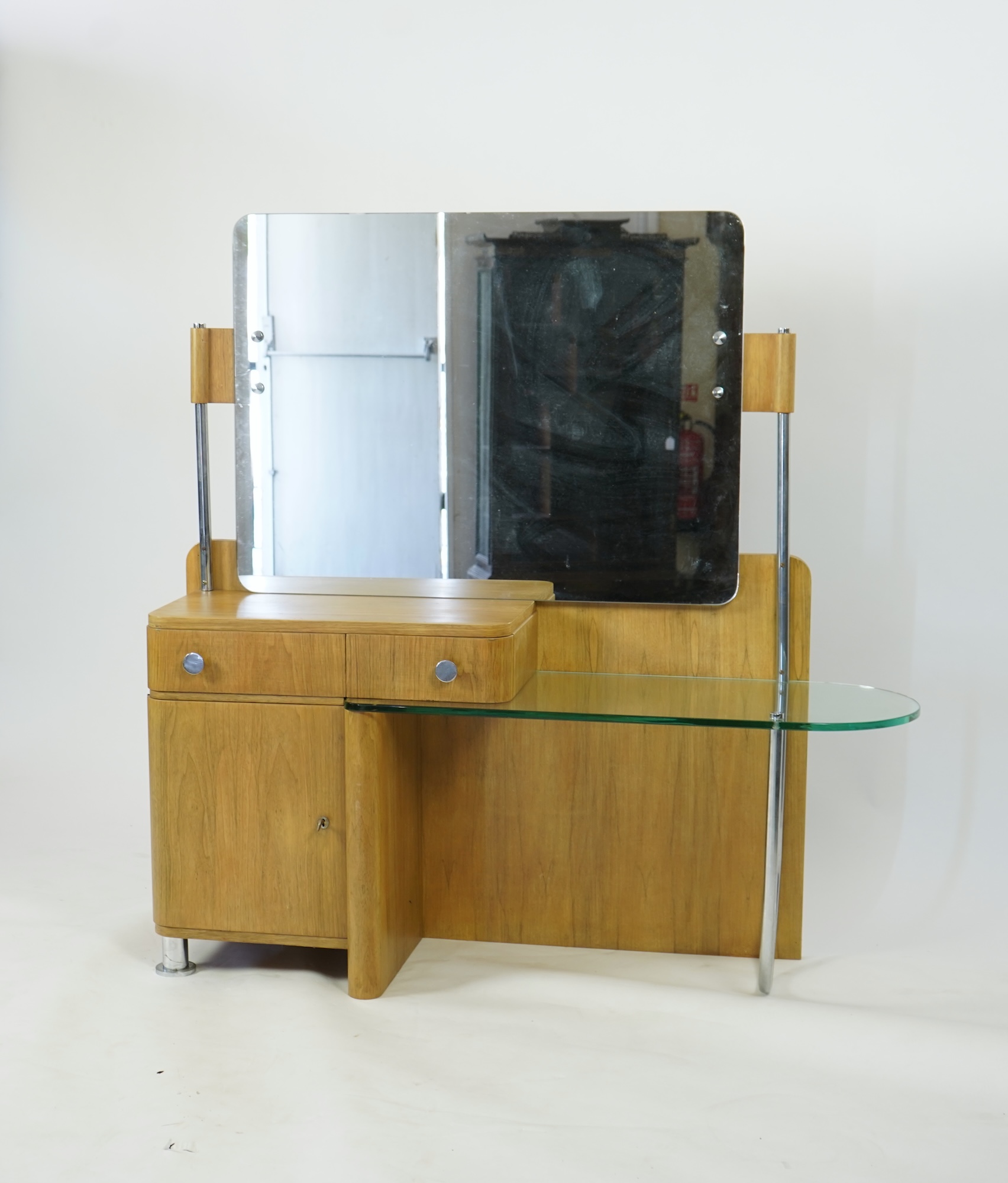 A Belgian Art Deco modernist walnut dressing table, by De Coene